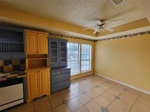 a view of walk in closet and window