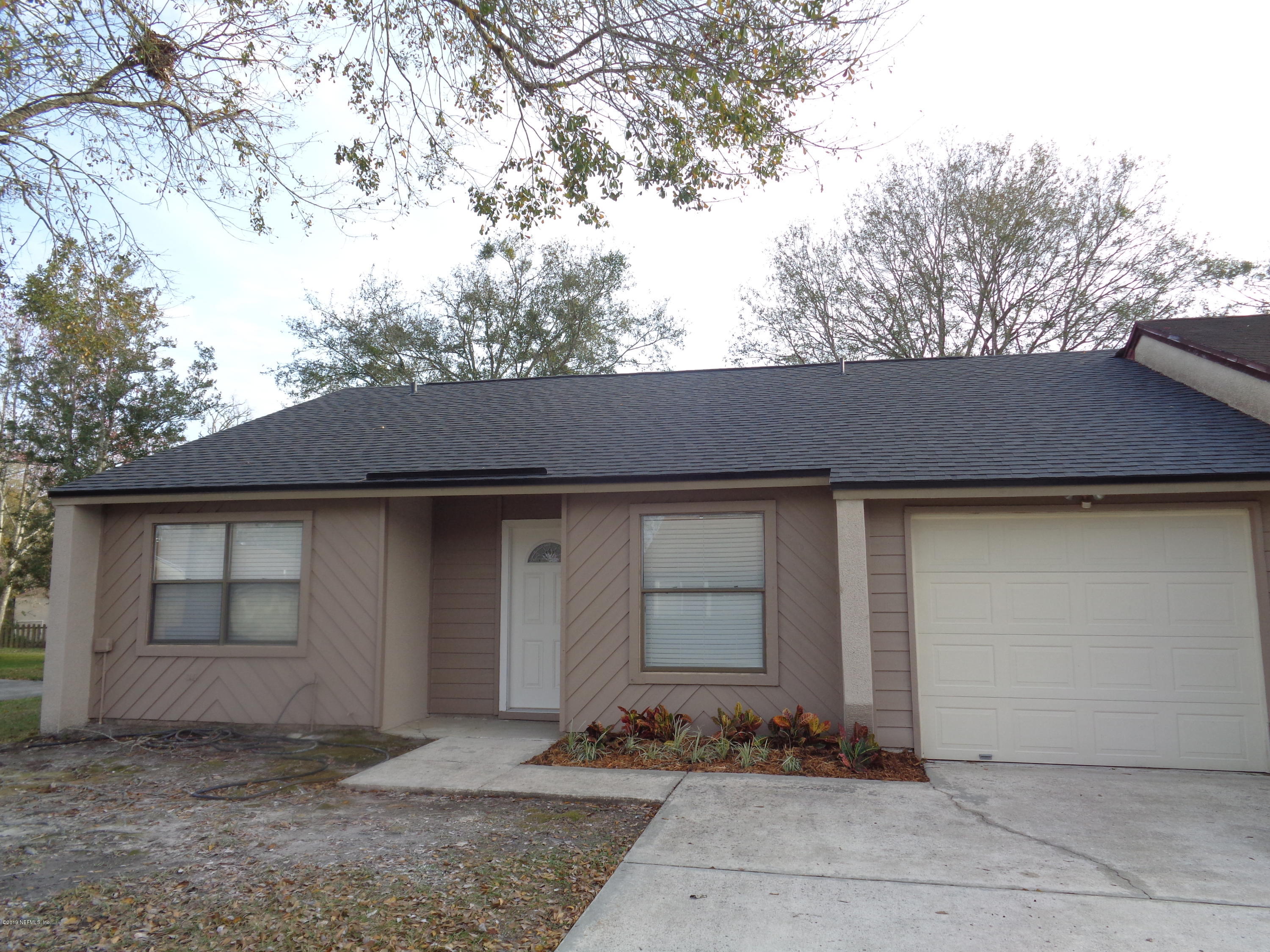 3422 Ricky Court Jacksonville, FL 32223 - Photo 1 of 10 a front view of house