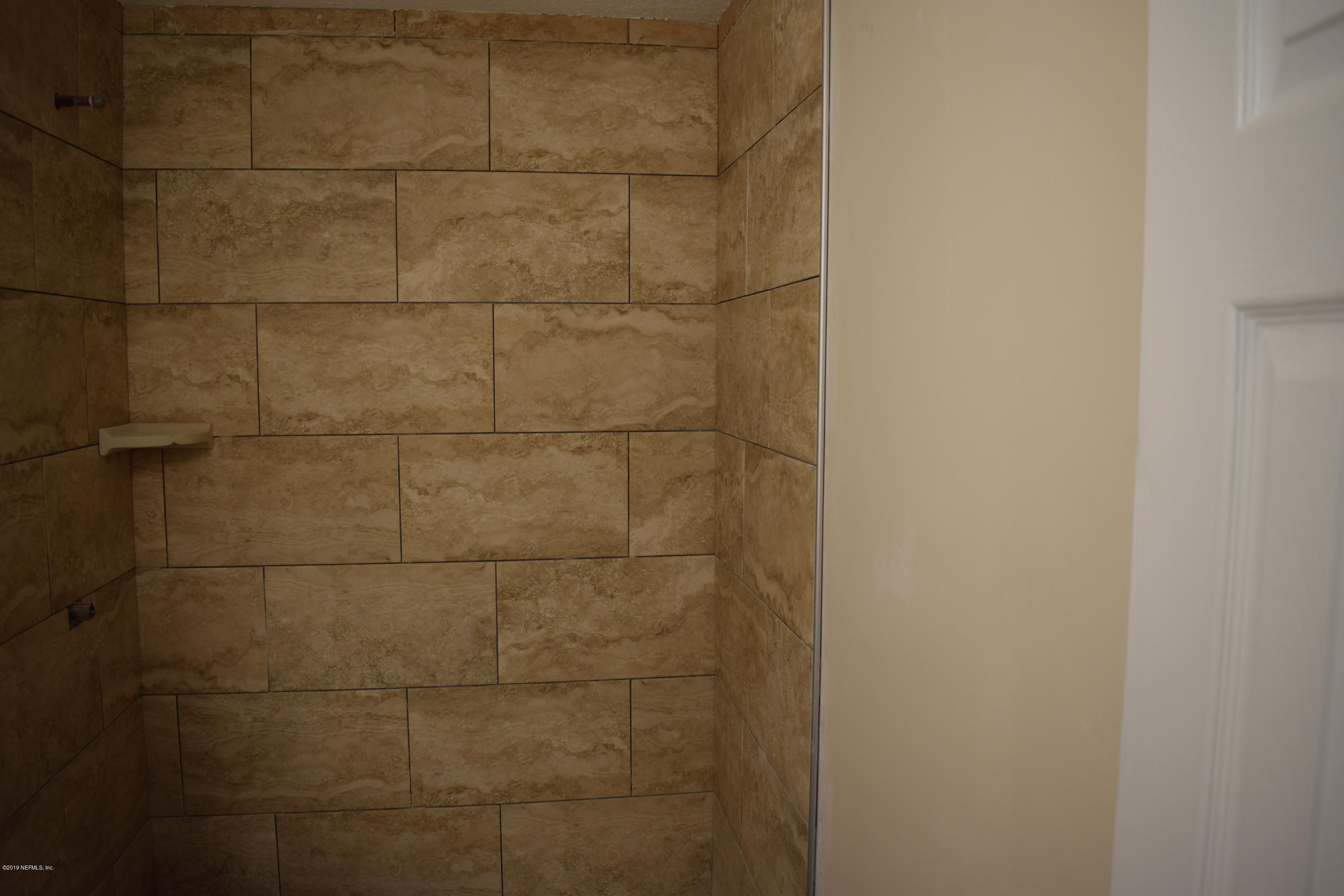 3422 Ricky Court Jacksonville, FL 32223 - Photo 4 of 10 a bathroom with a shower