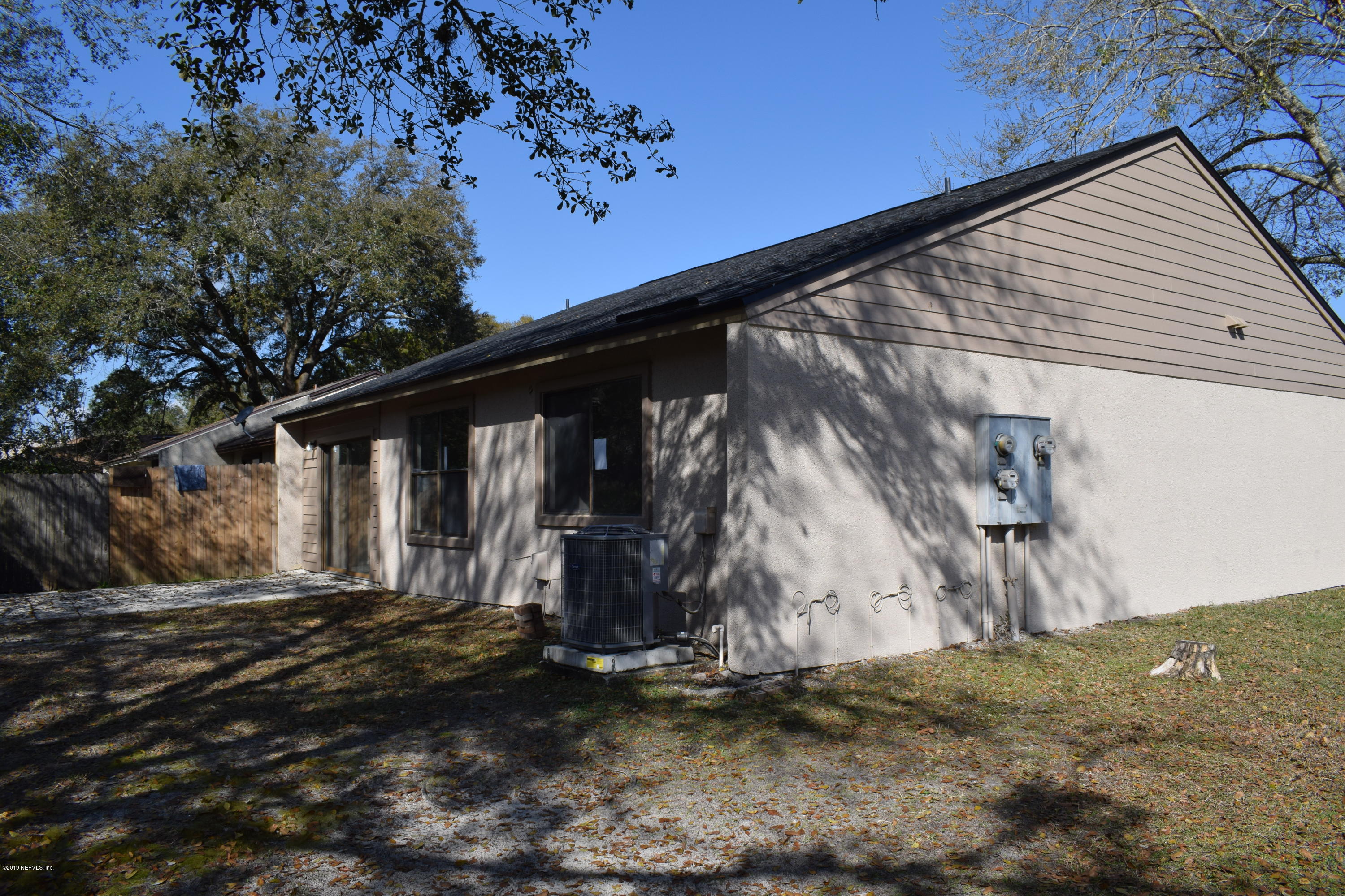3422 Ricky Court Jacksonville, FL 32223 - Photo 9 of 10 a view of a house with a yard