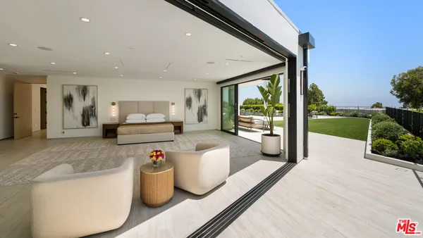 a bathroom with a double vanity sink toilet and shower