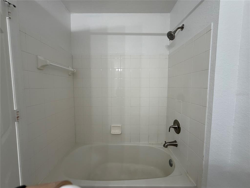 Undisclosed Address Orlando, FL 32821 - Photo 11 of 23 a close up of a bathtub