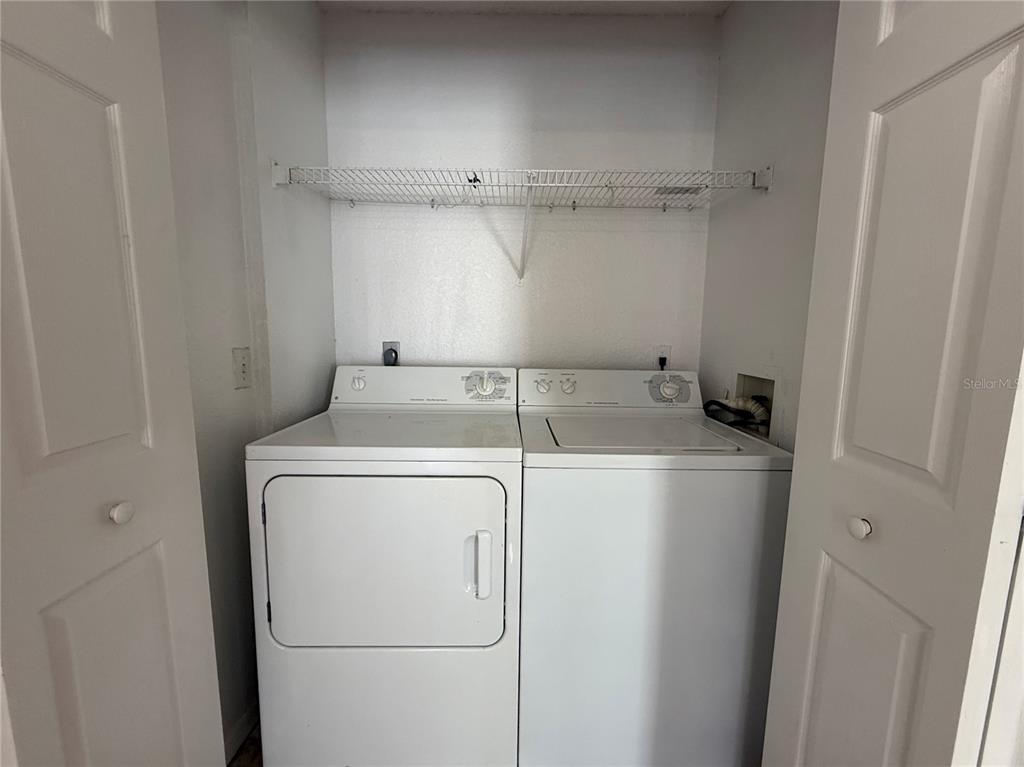 Undisclosed Address Orlando, FL 32821 - Photo 12 of 23 a utility room with dryer and washer