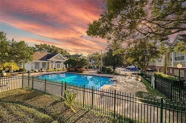 a view of a houses and city from the balcony