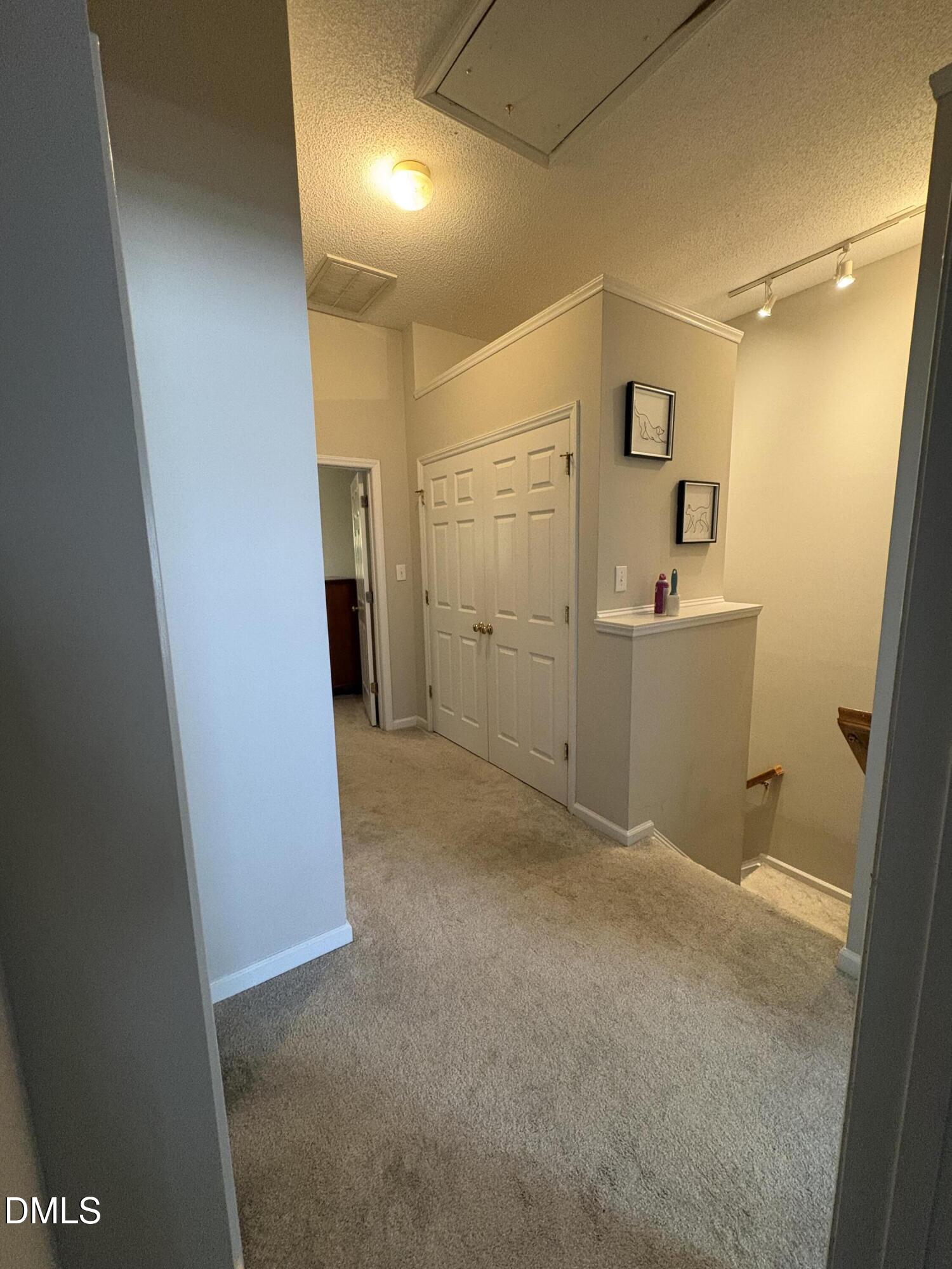 7342 Doverton Court Raleigh, NC 27615 - Photo 13 of 17 3Rd Floor landing