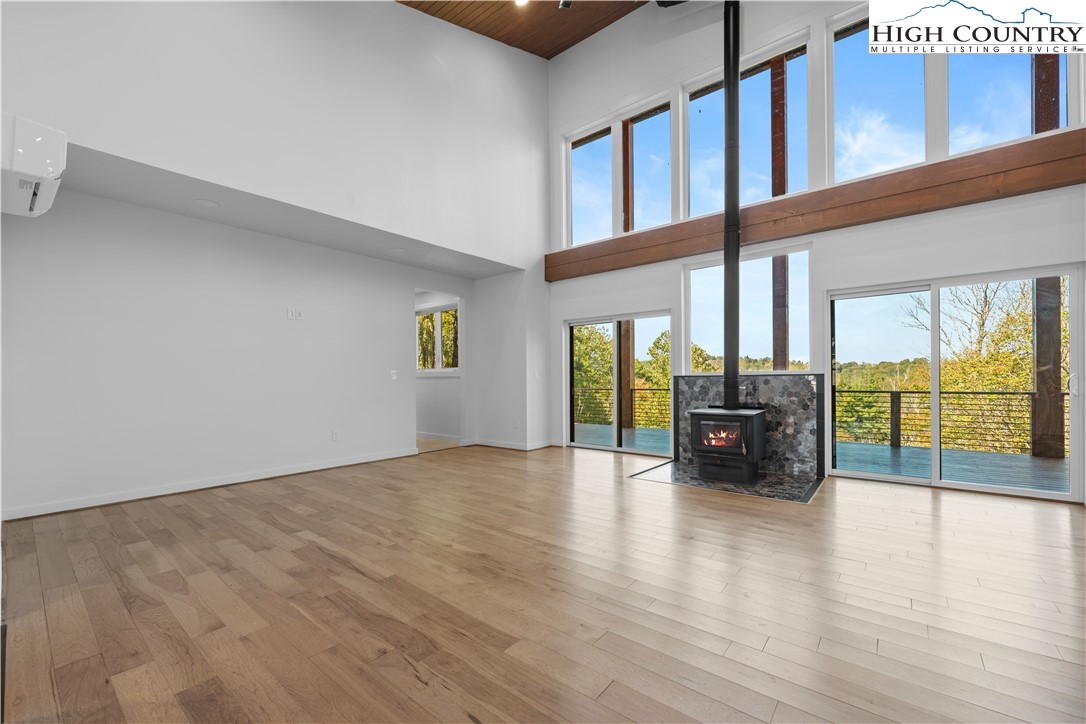 1075 Center Ct Drive Boone, NC 28607 - Photo 12 of 48 a view of livingroom with furniture and floor to ceiling window