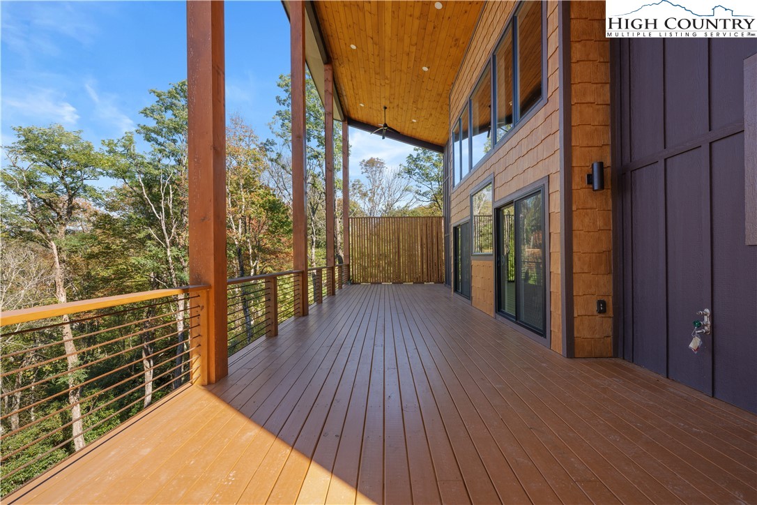 1075 Center Ct Drive Boone, NC 28607 - Photo 14 of 48 a view of a balcony with wooden floor