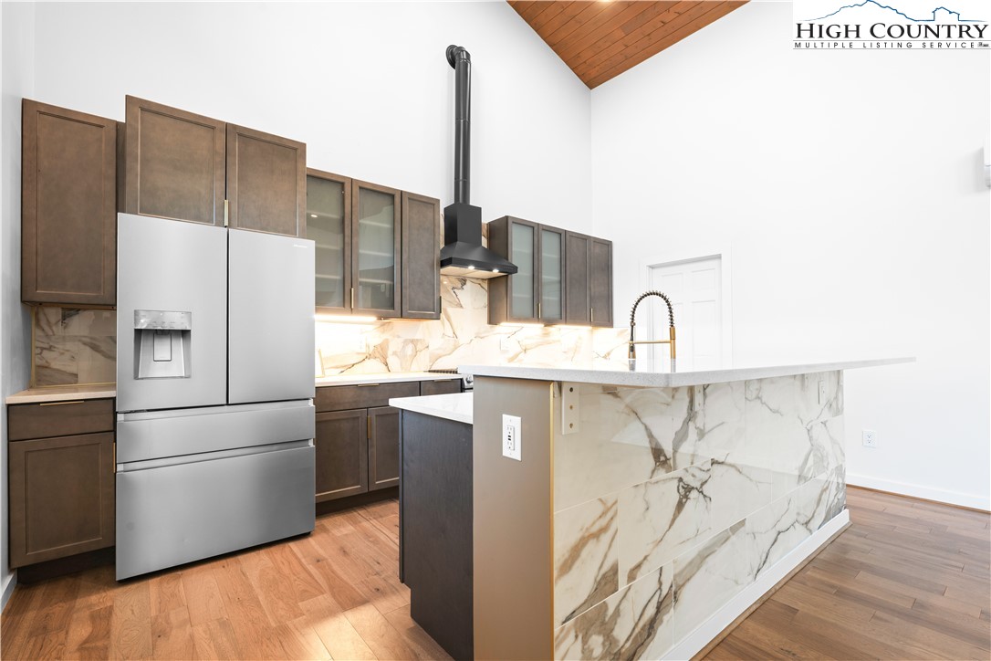 1075 Center Ct Drive Boone, NC 28607 - Photo 15 of 48 a kitchen with stainless steel appliances a refrigerator sink and cabinets