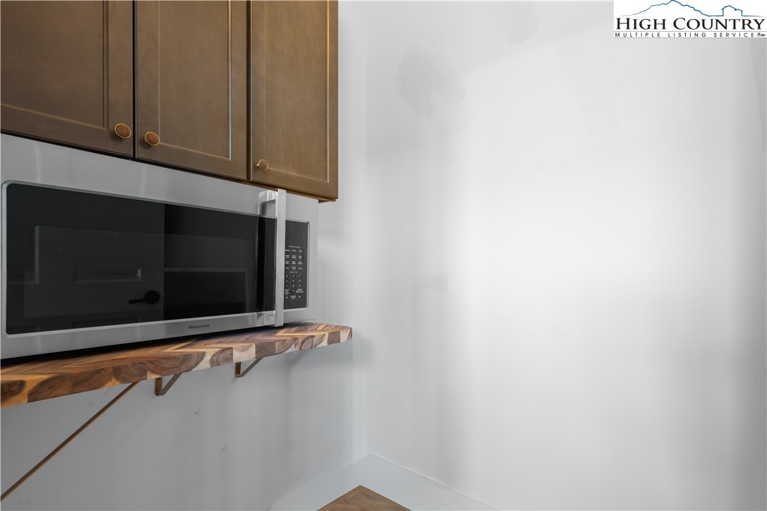 1075 Center Ct Drive Boone, NC 28607 - Photo 19 of 48 a microwave oven on the wall