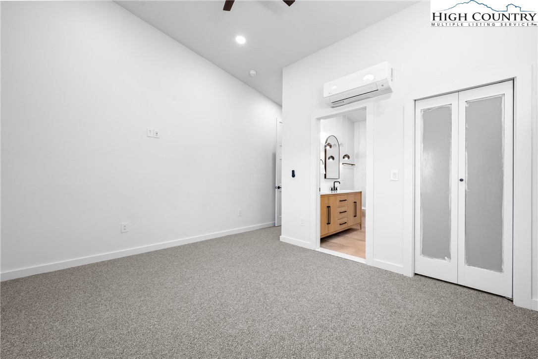 1075 Center Ct Drive Boone, NC 28607 - Photo 31 of 48 an empty room with a door