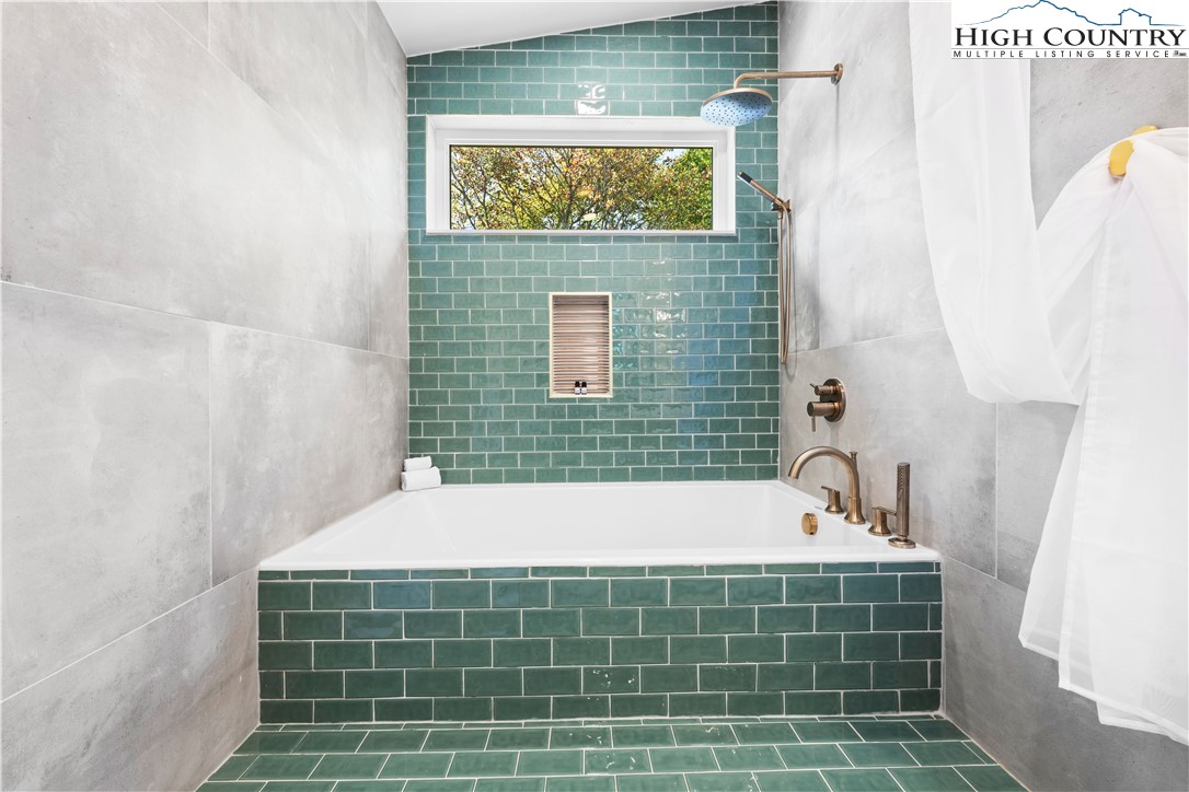 1075 Center Ct Drive Boone, NC 28607 - Photo 33 of 48 a bathroom with a bathtub and a shower