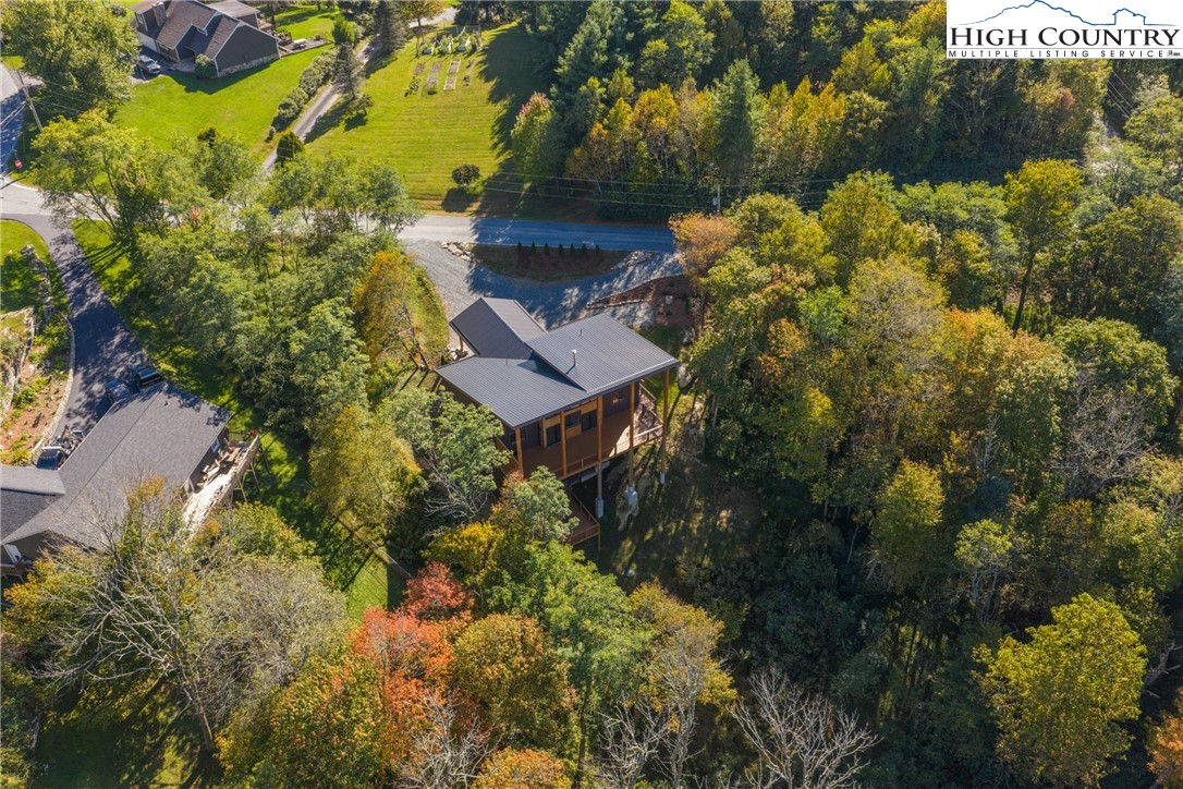 1075 Center Ct Drive Boone, NC 28607 - Photo 46 of 48 an aerial view of a house with a yard