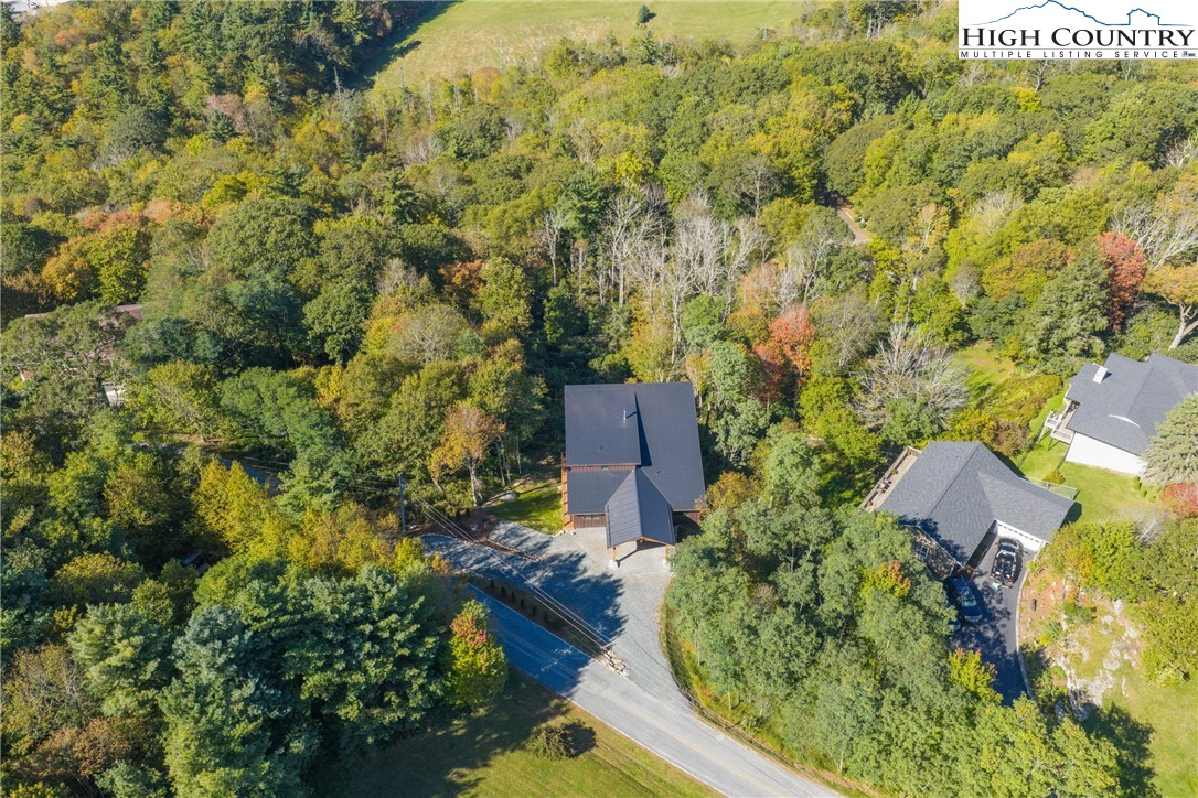 1075 Center Ct Drive Boone, NC 28607 - Photo 47 of 48 an aerial view of a house with a yard