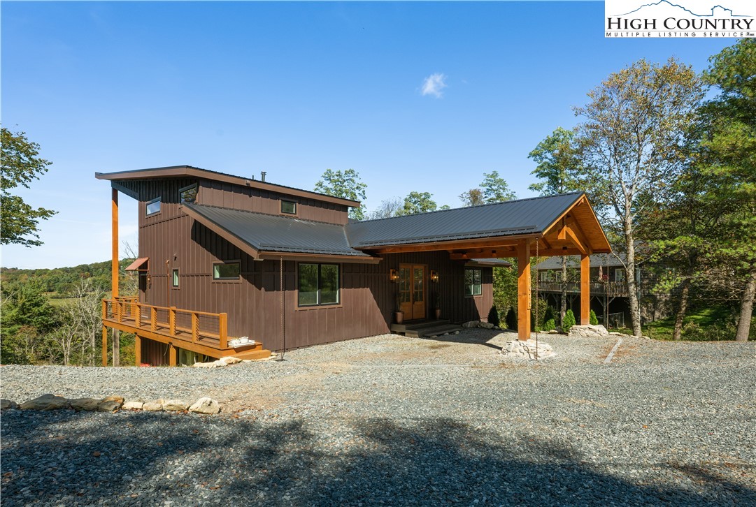 1075 Center Ct Drive Boone, NC 28607 - Photo 5 of 48 a front view of a house with a yard