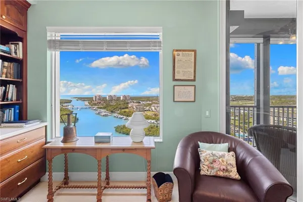 a view of a livingroom with furniture and window