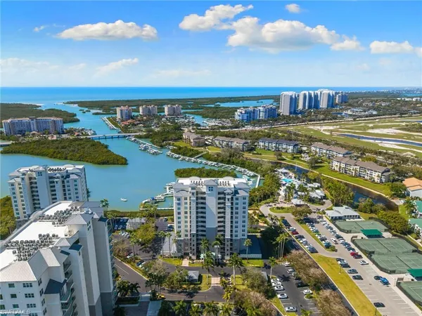 a view of a city with an ocean view