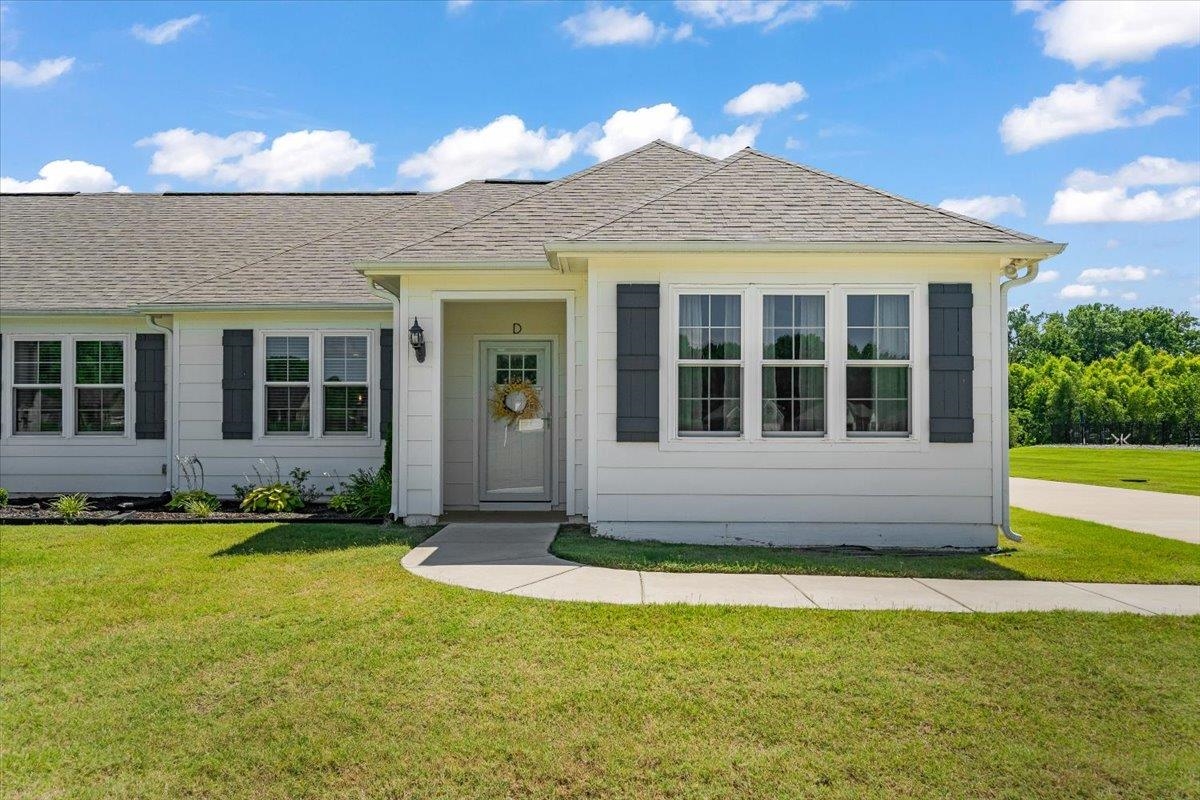 415 Abbey Road, Unit D Munford, TN 38058 - Photo 1 of 35 Single-story residence featuring white siding and a gray shingle roof