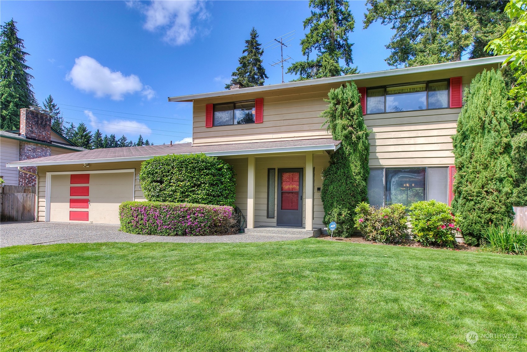 9503 127th Place Southeast Renton, WA 98056 - Photo 2 of 32 front view of a house with a yard