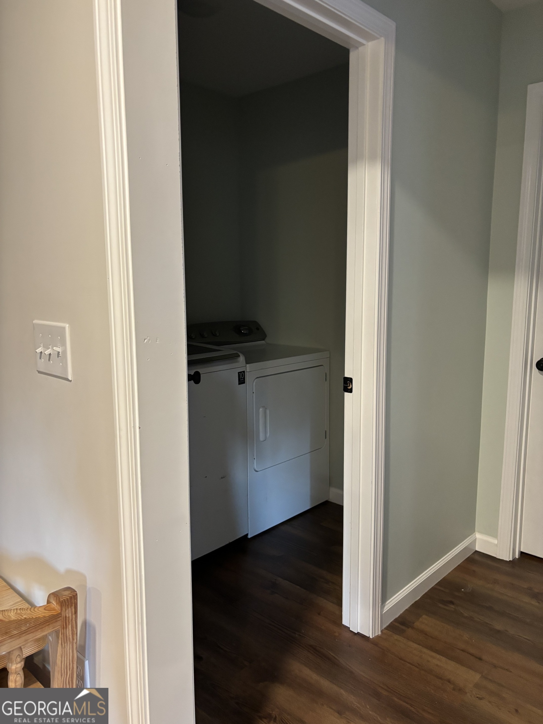 204 6th Avenue Menlo, GA 30731 - Photo 12 of 24 an empty room with wooden floor cabinet and door