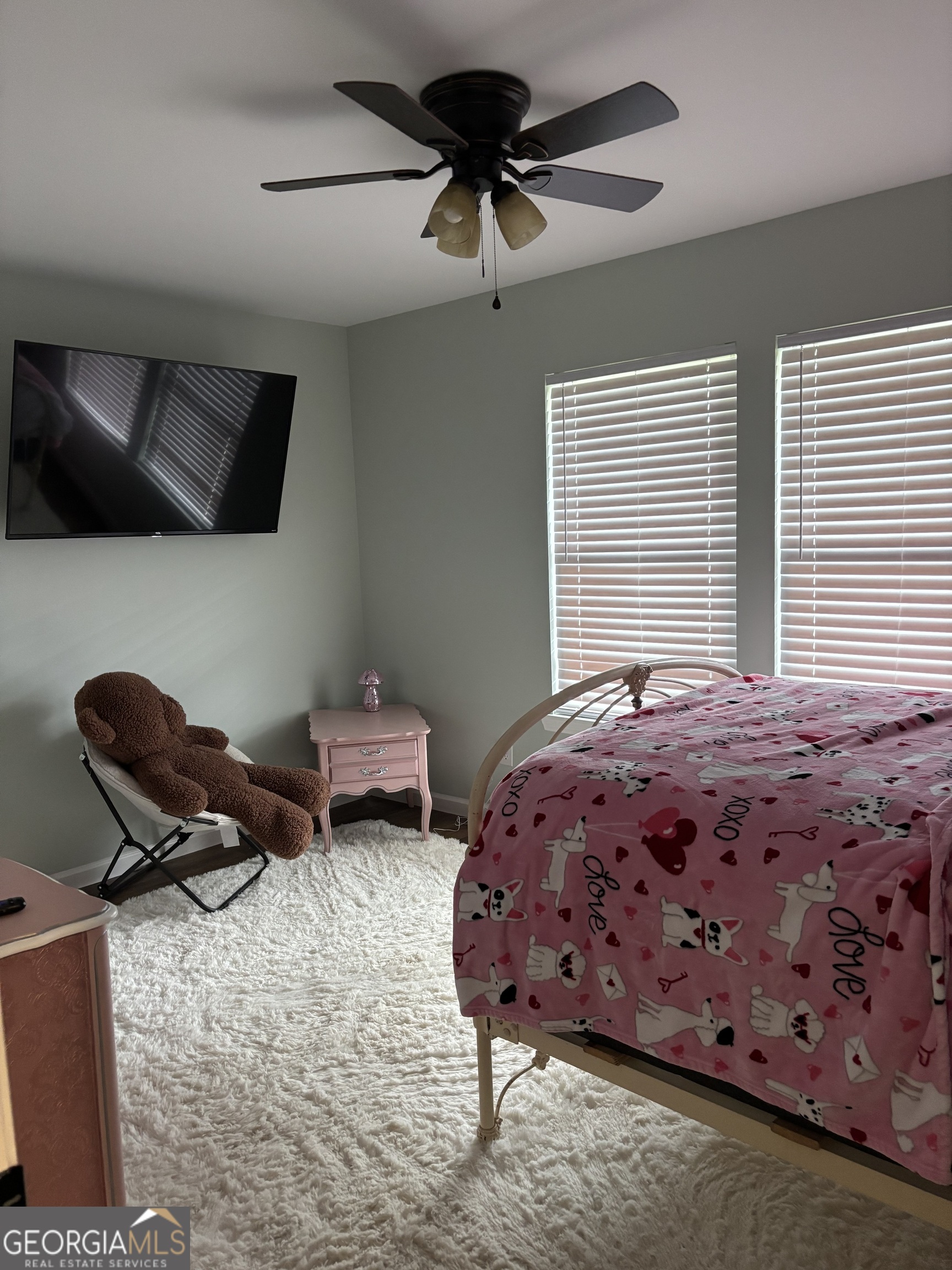 204 6th Avenue Menlo, GA 30731 - Photo 9 of 24 a bedroom with a bed a flat screen tv and window