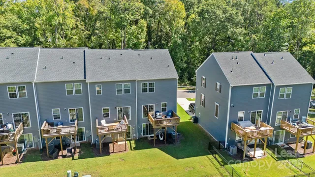 a view of a house with a yard porch and sitting area