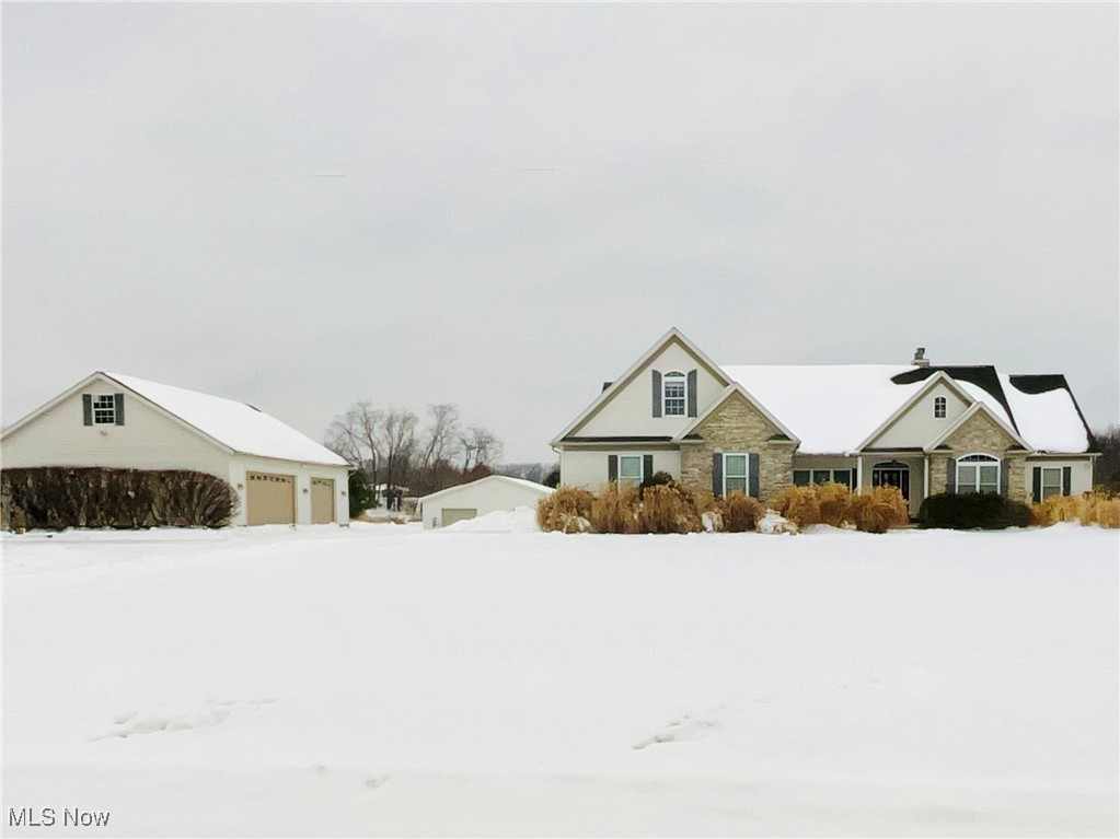 3079 Alexander Road Atwater, OH 44201 - Photo 1 of 45 View of front of house featuring an outbuilding, stone siding, and a chimney