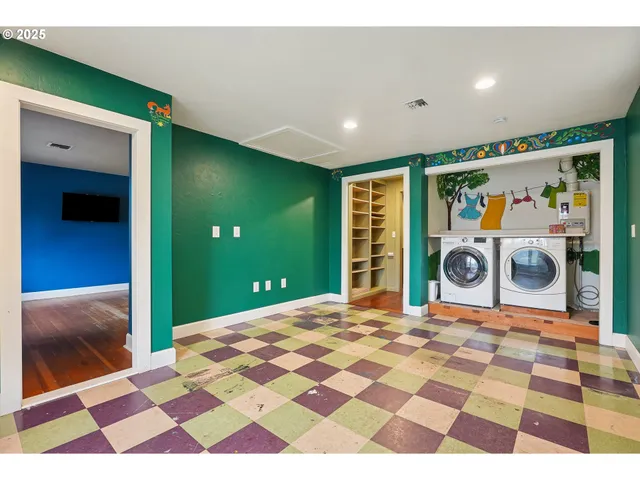 a bedroom with a bed and a rug