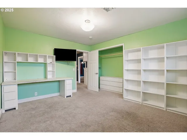 a view of room with walk in closet