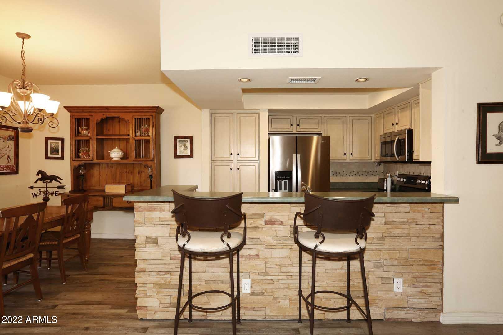9705 East Mountain View Road, Unit 1032 Scottsdale, AZ 85258 - Photo 13 of 51 Kitchen-Bar