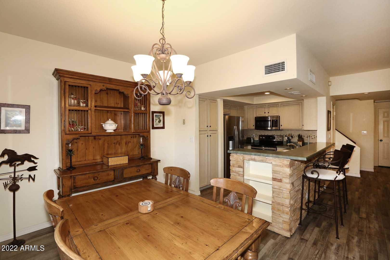 9705 East Mountain View Road, Unit 1032 Scottsdale, AZ 85258 - Photo 17 of 51 Dining Room2