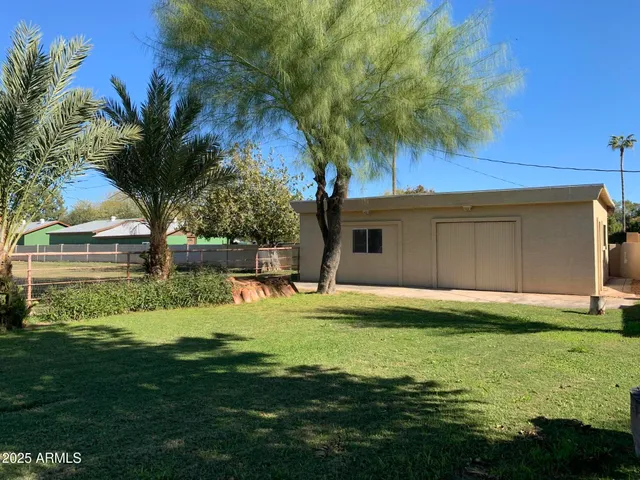 a view of a two chairs in patio