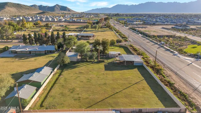 a view of a balcony with an outdoor seating space