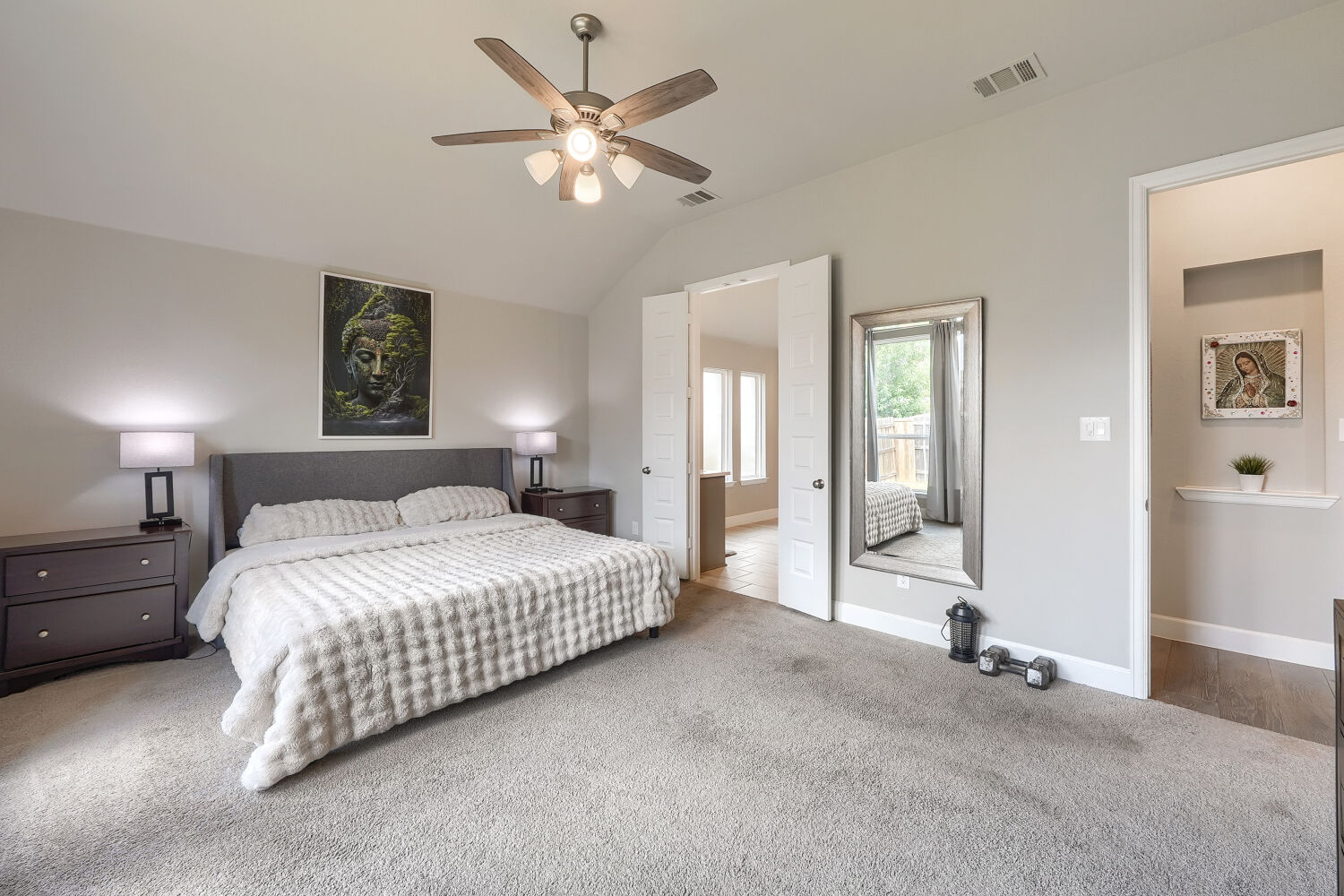 308 Fawn Riv Run Kyle, TX 78640 - Photo 9 of 25 A roomy primary suite with space to truly unwind.