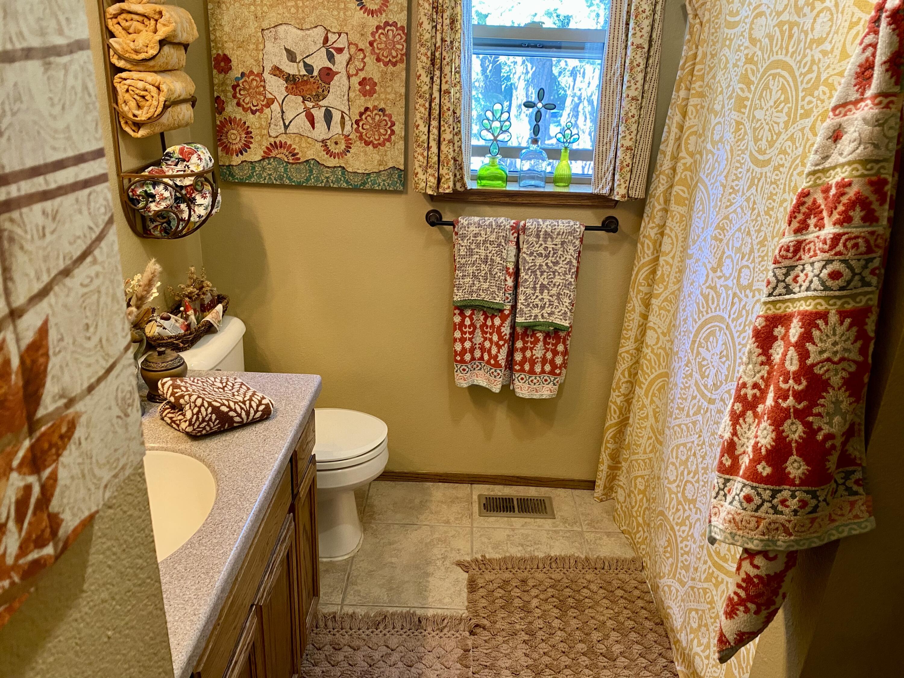 57968 Fox Drive Springville, CA 93265 - Photo 8 of 30 a bathroom with a toilet and a shower curtain
