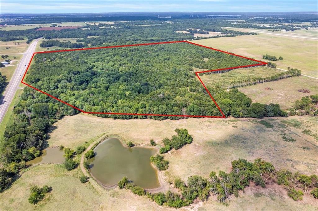 0 Tx-121 & Airport Road Bonham, TX 75418 - Photo 13 of 19 a view of a lake with a mountain