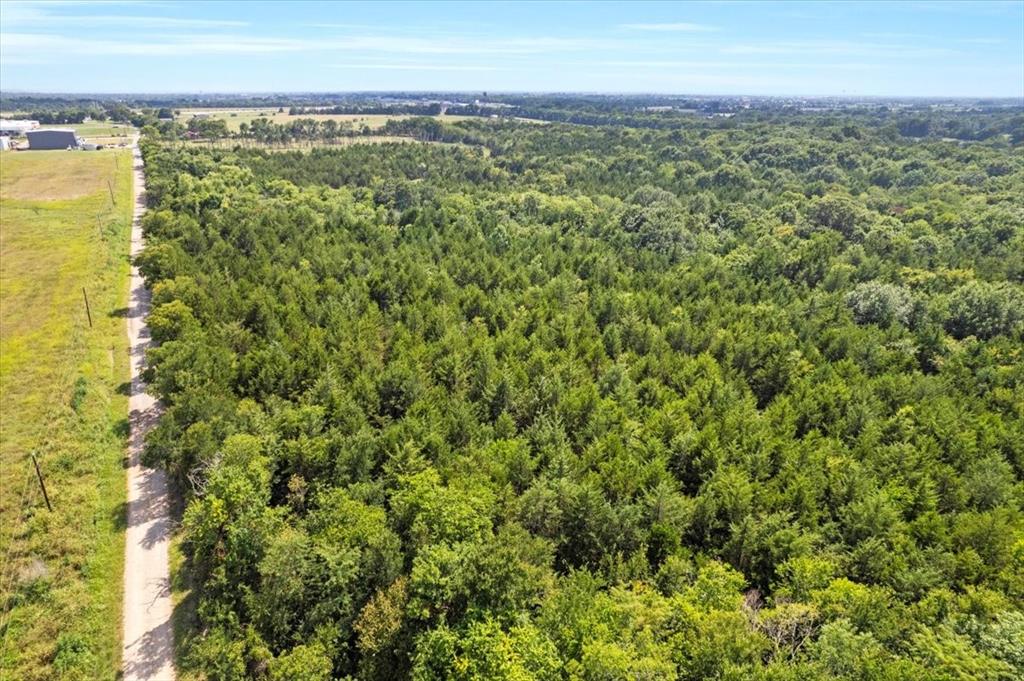 0 Tx-121 & Airport Road Bonham, TX 75418 - Photo 17 of 18 a view of a city