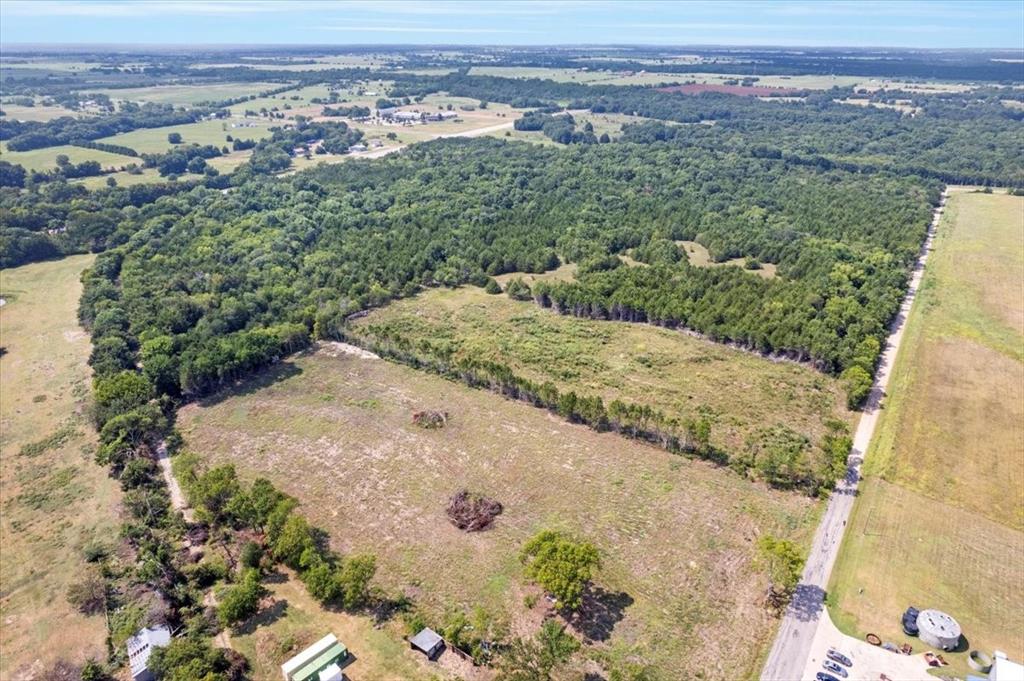 0 Tx-121 & Airport Road Bonham, TX 75418 - Photo 4 of 19 an aerial view of a houses