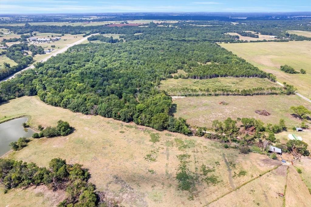 0 Tx-121 & Airport Road Bonham, TX 75418 - Photo 4 of 18 a view of a lake with a mountain