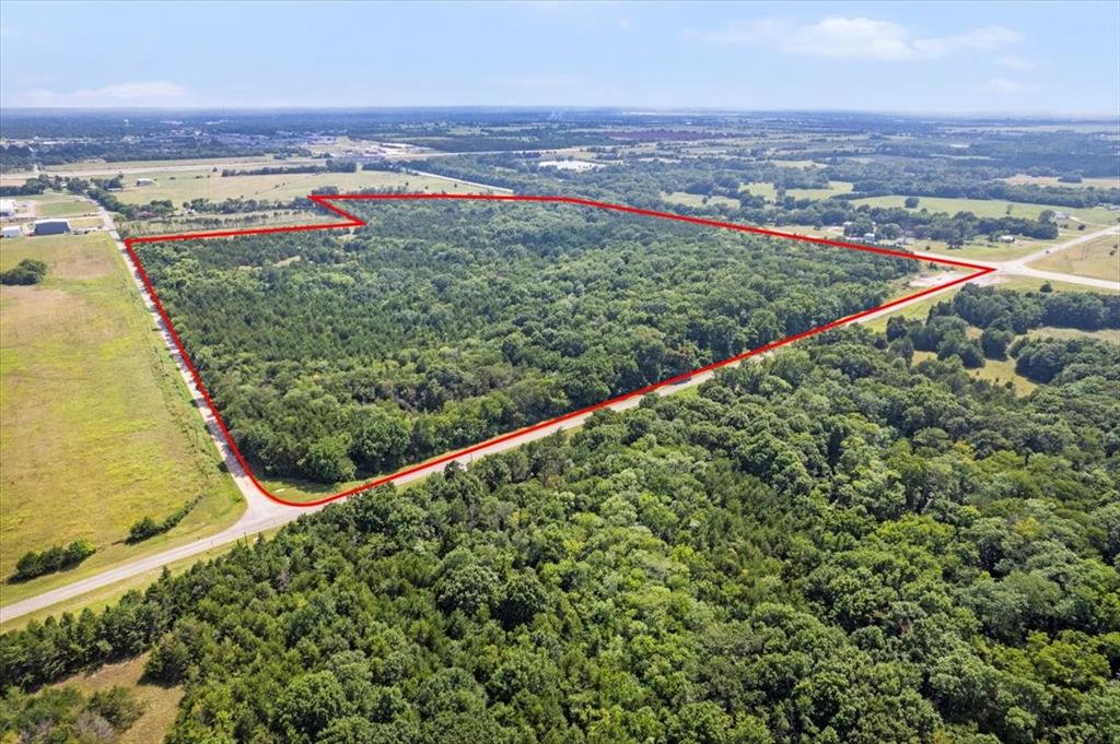 0 Tx-121 & Airport Road Bonham, TX 75418 - Photo 9 of 18 an aerial view of beach and residential houses with outdoor space