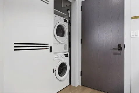 a bedroom with a bed and a mirror