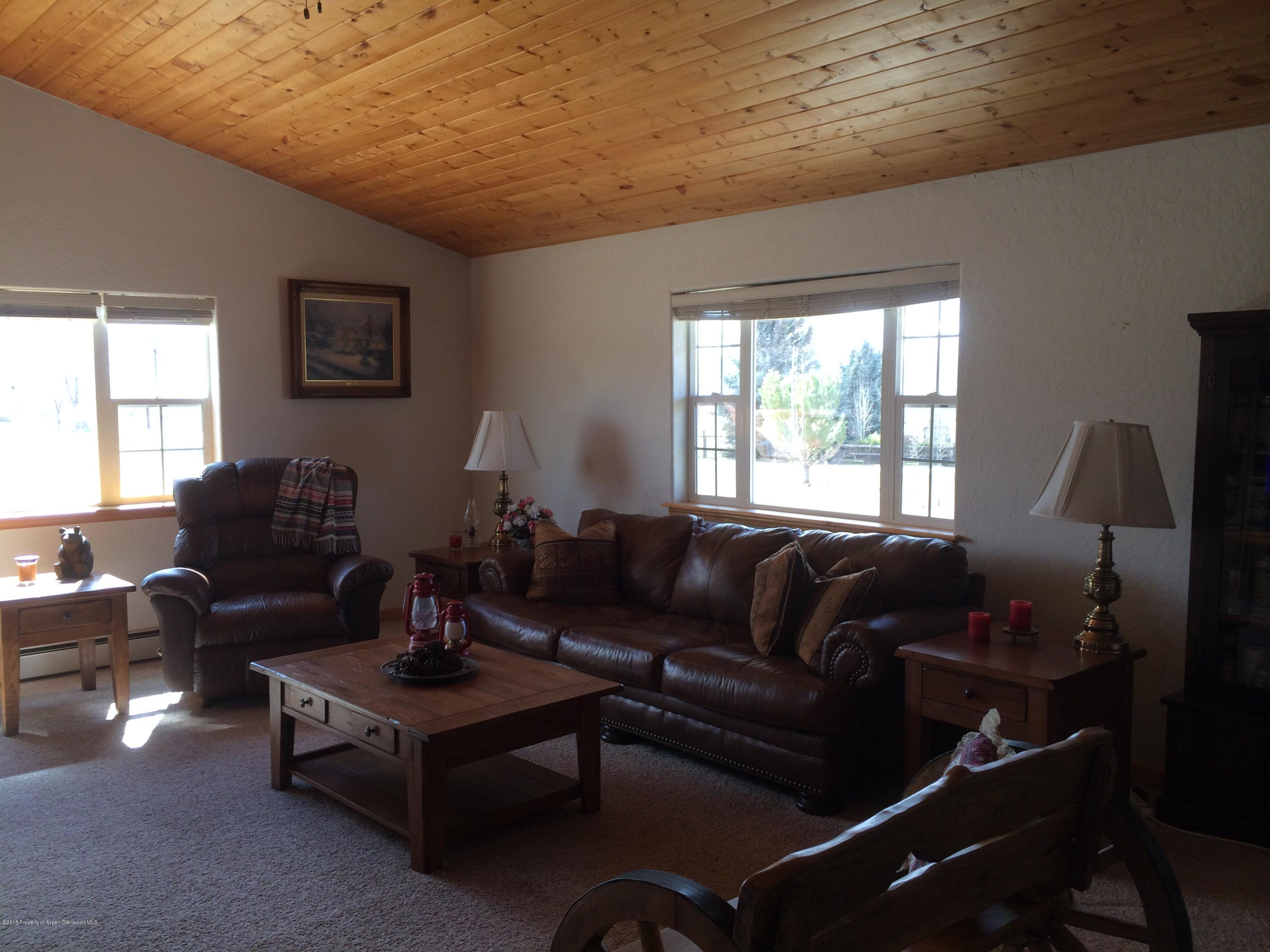 200 Fox Run Road Rifle, CO 81650 - Photo 3 of 21 a living room with furniture and a window
