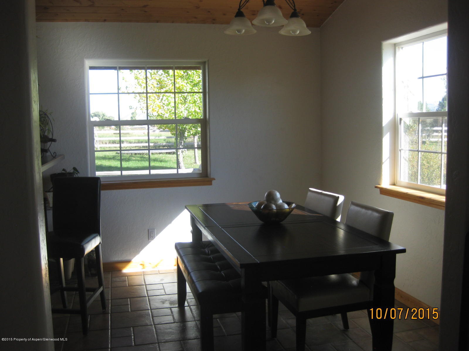 200 Fox Run Road Rifle, CO 81650 - Photo 4 of 21 a table and chairs in a room next to a window