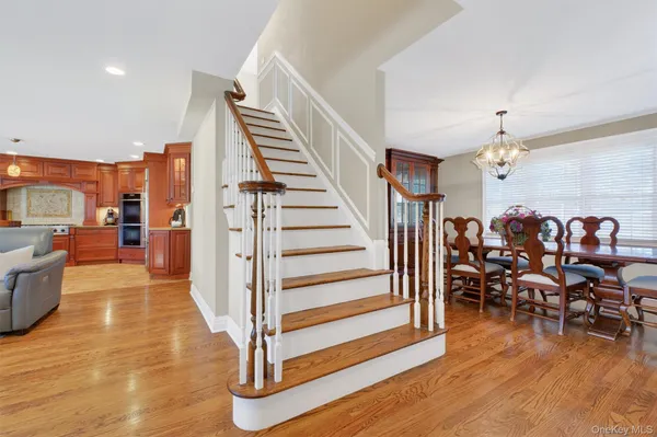 a view of a living room and entry way