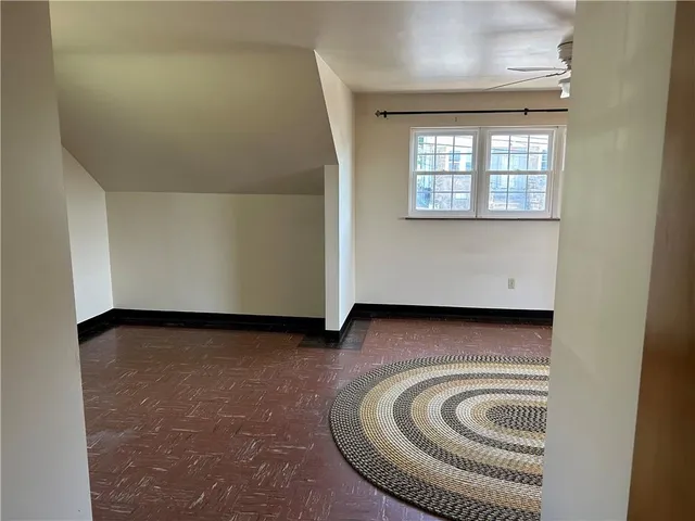 a view of a livingroom with washer and dryer