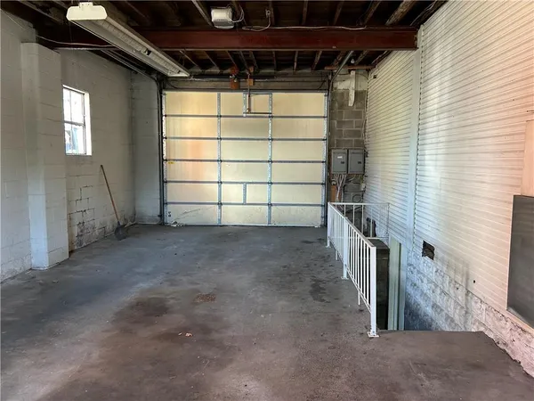 a view of a room with wooden walls