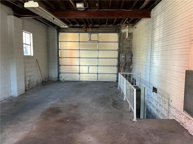 a view of a room with wooden walls