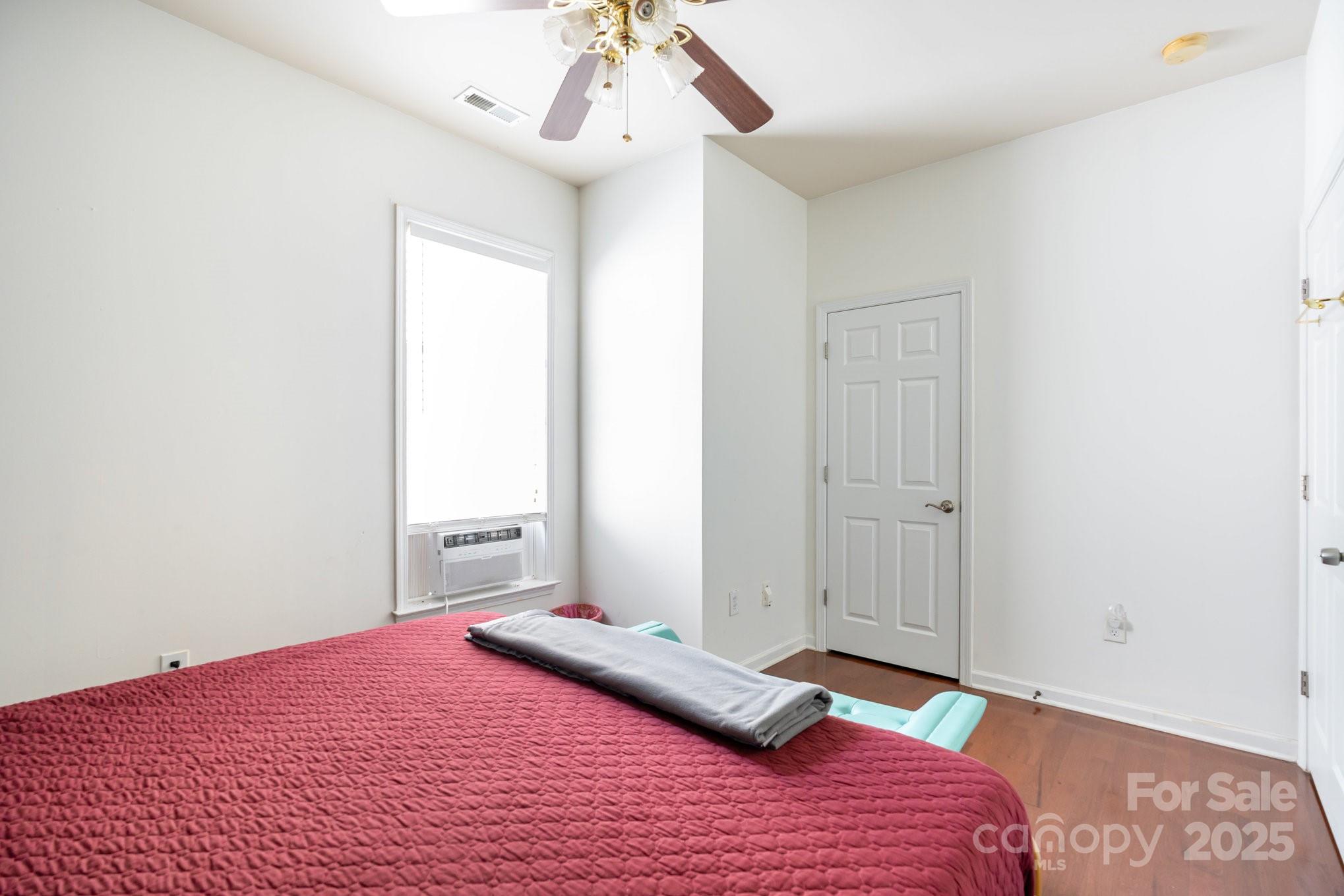 306 Nance Road Charlotte, NC 28214 - Photo 17 of 40 a bedroom with a bed and a window