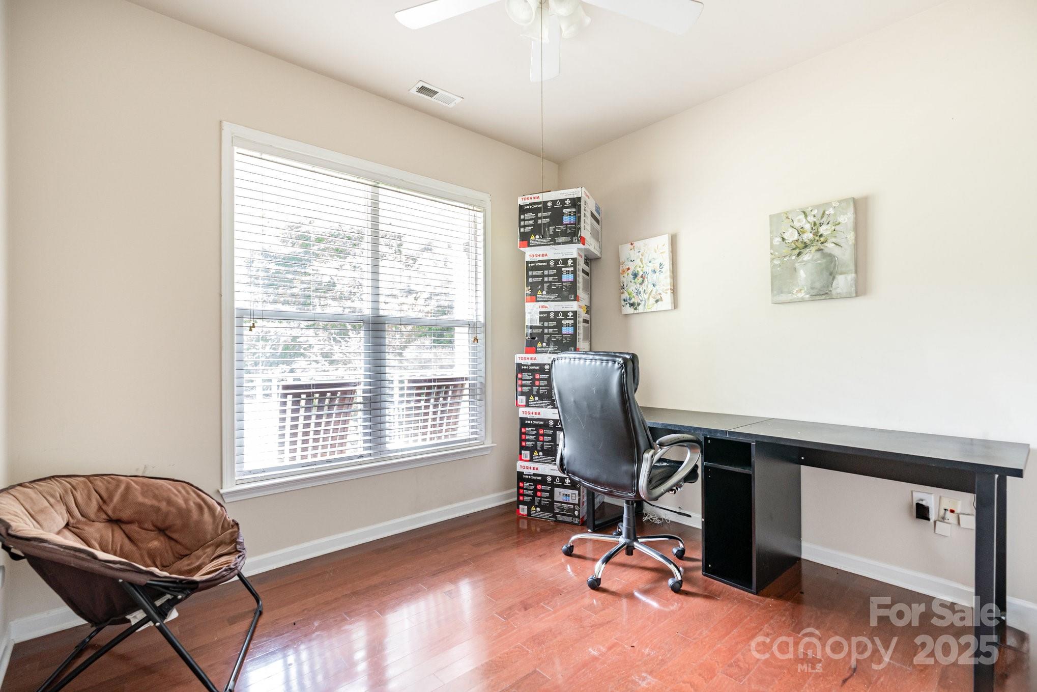 306 Nance Road Charlotte, NC 28214 - Photo 28 of 40 a view of a workspace with furniture and a window