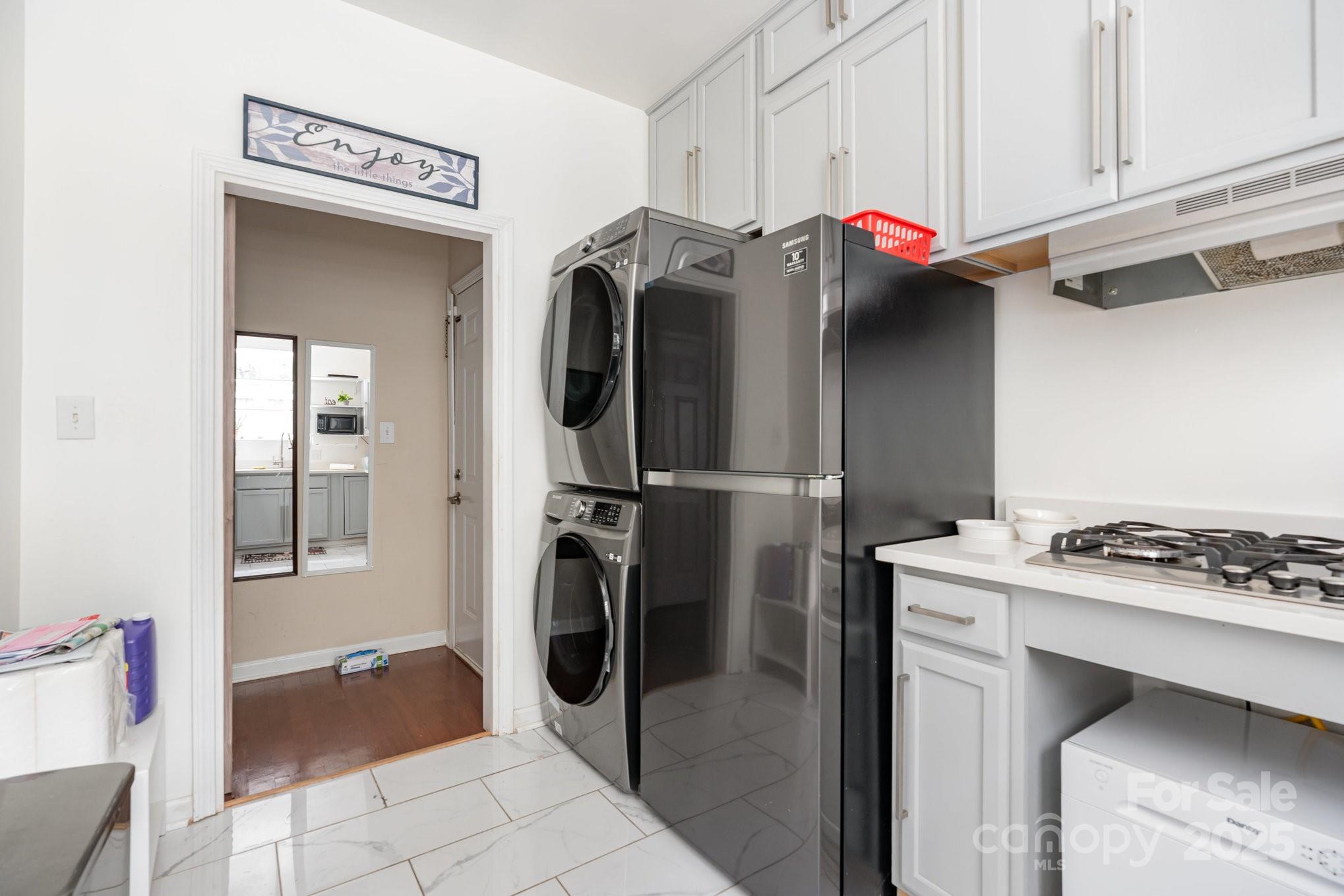 306 Nance Road Charlotte, NC 28214 - Photo 31 of 40 a utility room with dryer and washer
