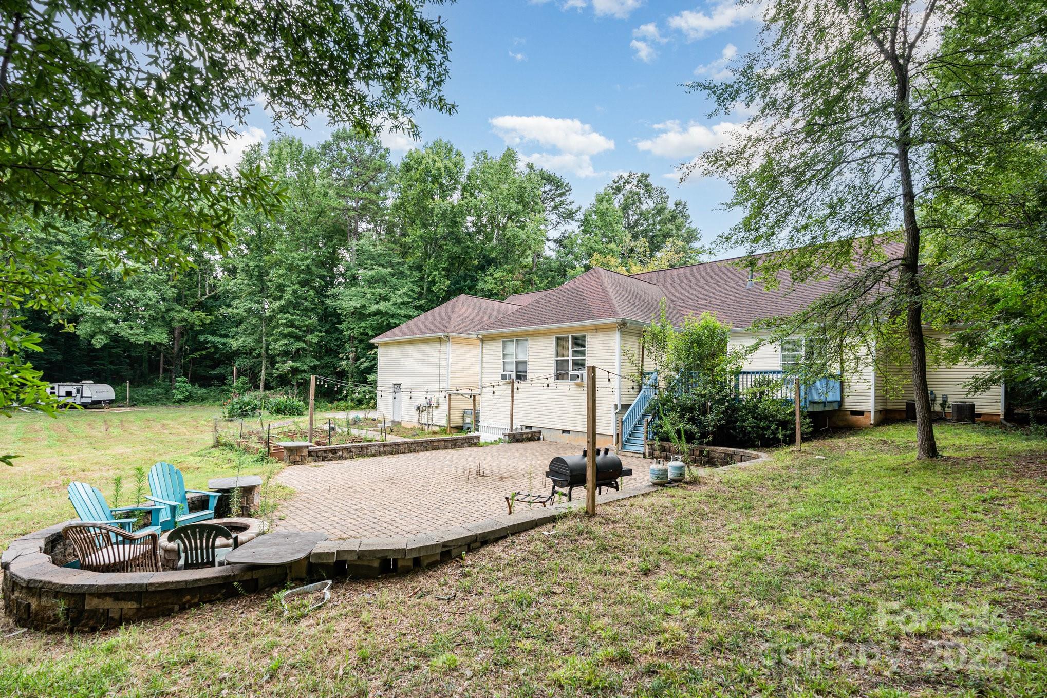 306 Nance Road Charlotte, NC 28214 - Photo 35 of 40 a view of a house with backyard and sitting area